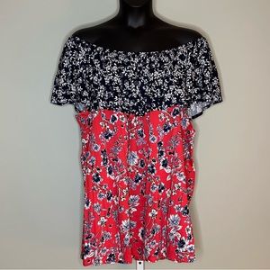 Woman within off the shoulder top. Blue and red. 4X